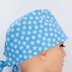Lt Blue w/Flowers Medical Bonnet. Enjoy FREE shipping when you spend 35 dollars or more!