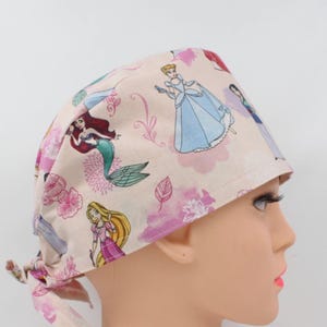 Cartoon Medical Bonnet, Doctor Scrub Cap, Nurse Cap, Pediatrics scrub cap.   Enjoy FREE shipping when you spend 35 dollars or more!
