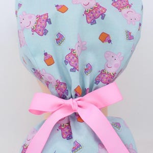 Cartoon Pigs Pony Tail Bonnet, Vet Tech bonnet, Scrub cap, Medical cap, Enjoy FREE shipping when you spend 35 dollars or more!