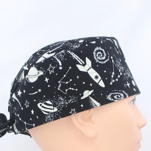 Space Glow-in-the-Dark Mens Scrub Cap, Mens OR Cap, Medical Cap, Doctor Cap.   Enjoy FREE shipping when you spend 35 dollars or more!