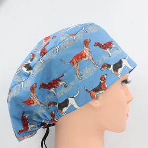 Hunting Dogs Euro/Toggle bonnet.  Enjoy free shipping when you spend 35 dollars or more!