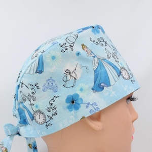 Cartoon in Blue Medical Bonnet, Doctor Scrub Cap, Nurse Cap, Pediatrics scrub cap.   Enjoy FREE shipping when you spend 35 dollars or more!