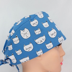 White Cat Faces Medical Bonnet. Enjoy FREE shipping when you spend 35 dollars or more!