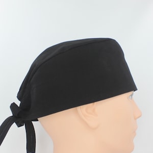Black Solid Color Mens Scrub Cap, Mens OR Cap, Medical Cap, Doctor Cap, Tie Cap.  Enjoy FREE shipping when you spend 35 dollars or more!