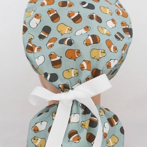 Guinea Pig Pony Tail Medical Bonnet.    Enjoy FREE shipping when you spend 35 dollars or more!