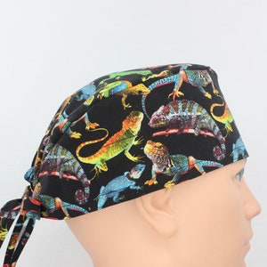 Lizards on Black Mens Scrub Cap. Enjoy FREE shipping when you spend 35 dollars or more!