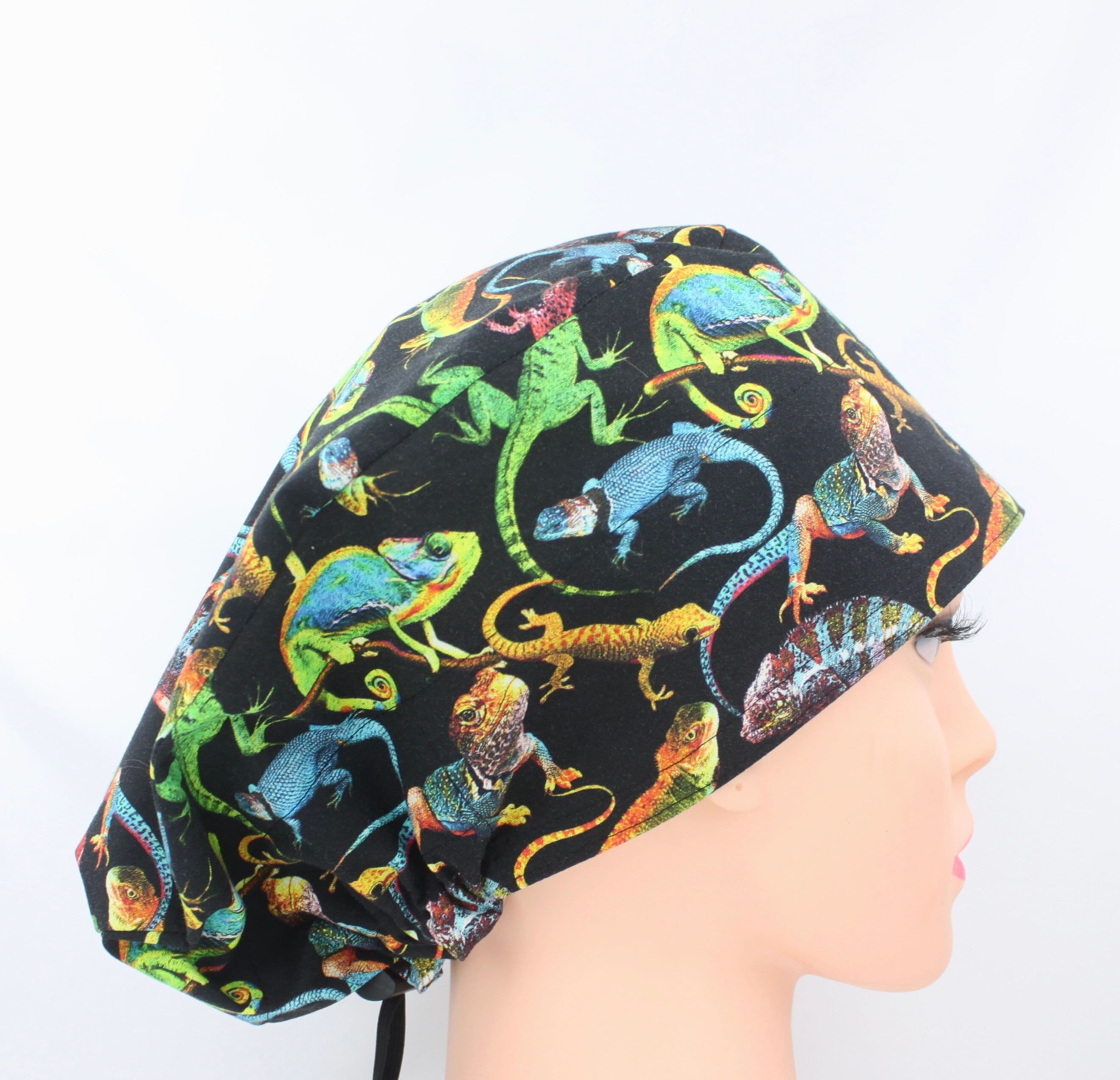 Lizards on Black Euro Toggle Medical Bonnet.    Enjoy FREE shipping when you spend 35 dollars or more!
