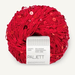 May include: A ball of bright red yarn embellished with numerous small, shiny red sequins. A white paper label is wrapped around the center, featuring the text 4290, Sandnes Garn, Den Norske Garnfabrikken Siden 1888, and Paljett, along with 55% bomull, 45% polyester.