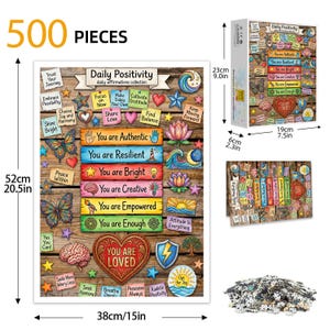 Puede incluir: Un rompecabezas de 500 piezas con un dise&ntilde;o de tablones de madera. El rompecabezas presenta afirmaciones inspiradoras e ilustraciones coloridas, incluyendo mariposas, corazones y estrellas. El rompecabezas ensamblado mide 38 cm de ancho y 52 cm de alto.