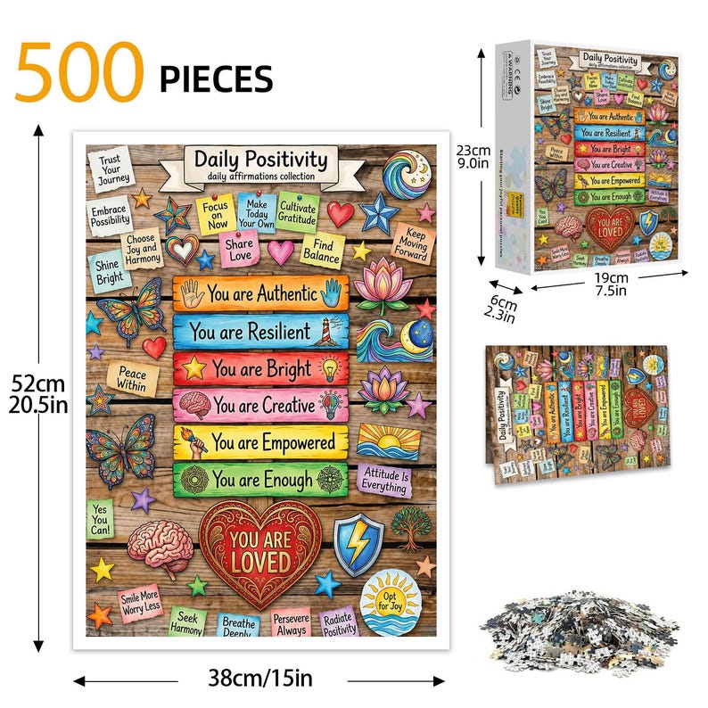 Puede incluir: Un rompecabezas de 500 piezas con un dise&ntilde;o de tablones de madera. El rompecabezas presenta afirmaciones inspiradoras e ilustraciones coloridas, incluyendo mariposas, corazones y estrellas. El rompecabezas ensamblado mide 38 cm de ancho y 52 cm de alto.