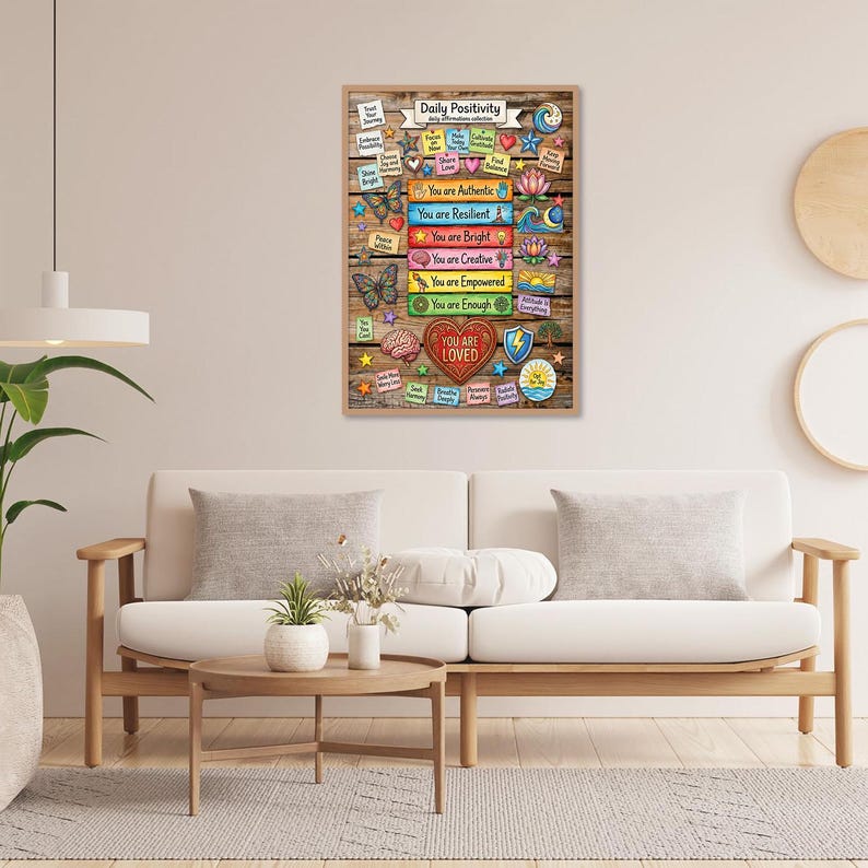 Puede incluir: Un letrero de madera enmarcado con las palabras "Daily Positivity" en la parte superior. El letrero presenta bloques de texto coloridos con afirmaciones positivas como "You are Authentic" y "You are Loved". Elementos decorativos incluyen estrellas, corazones y mariposas.