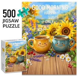 Puede incluir: Una caja de rompecabezas de 500 piezas con una ilustración alegre. La imagen muestra dos tazas de café sonrientes, una amarilla y otra azul, con un fondo floral y las palabras "Good Morning Happy Vibes Only."