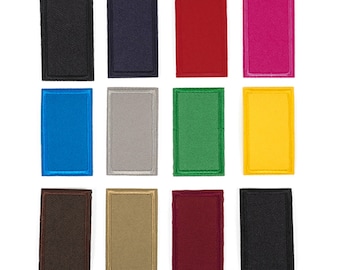 May include: Twelve iron-on or sew-on patches in various colours, including black, navy blue, red, pink, blue, grey, green, yellow, brown, beige, maroon, and black. Each patch is rectangular and measures 4.5 cm by 2.5 cm.