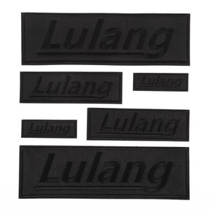 May include: Five black fabric patches with the word "Lulang" embroidered in white.