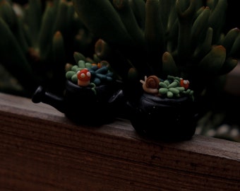 Figurine | The well-filled watering can