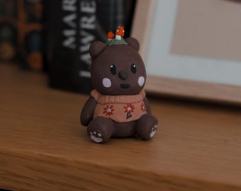 Chloe, Teddy bear in a pink flowery sweater