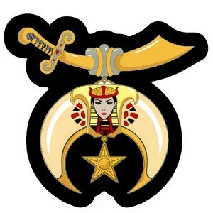 May include: A black and gold Masonic emblem with a crescent moon, a five-pointed star, and a woman's face in the center.