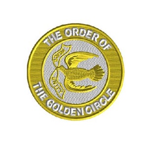 May include: A gold circular patch with the text "The Order of The Golden Circle" in white lettering. A white dove with a gold outline is centered on the patch with a banner that reads "Unity" and "1928".