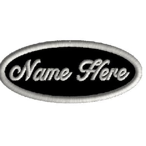 May include: Black and white oval-shaped patch with the text "Name Here" in a white cursive font.