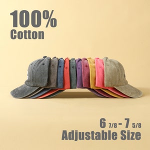 May include: A row of 10 baseball caps in various colors, including gray, blue, red, purple, yellow, and pink. The caps are made of 100% cotton and have an adjustable size of 6 7/8 - 7 5/8.