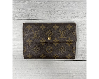 Louis Vuitton Porte International wallet 11.22