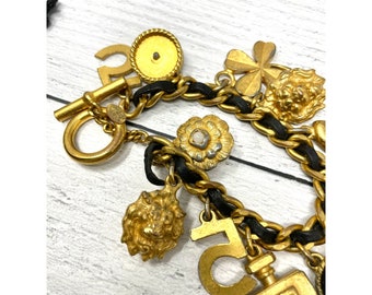 Chanel 1990s Gold and Black Woven Leather Novelty Logo Medallion