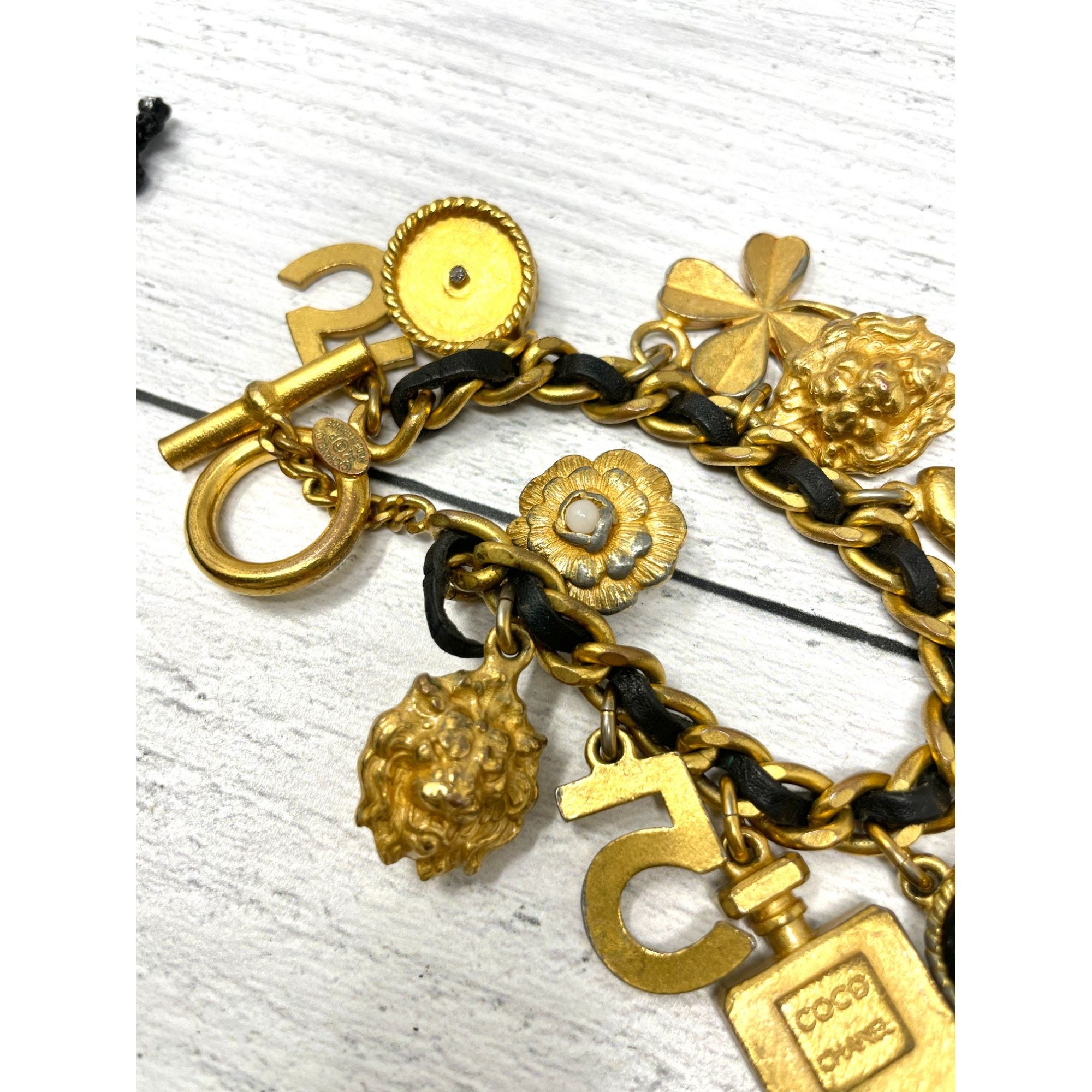 Chanel 1990s Gold and Black Woven Leather Novelty Logo Medallion