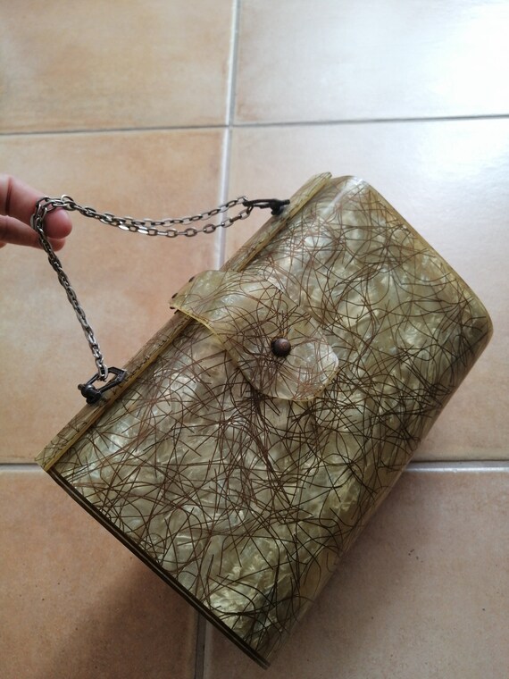 Gold and green lucite handbag
