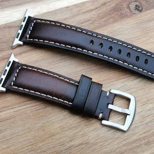 Berlin brown leather apple watch strap. Padded brown leather apple watch band with a 316L brushed stainless steel buckle and apple watch connectors.