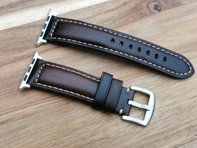 Berlin brown leather apple watch strap. Padded brown leather apple watch band with a 316L brushed stainless steel buckle and apple watch connectors.