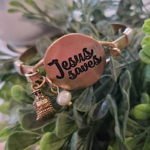 Jesus saves, Stamped metal bracelet with charms