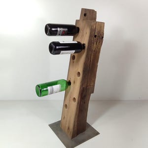 Wine rack made of old half-timbered beams old wood oak wine rack