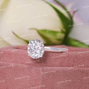 round cut moissanite solitaire engagement ring with hidden halo