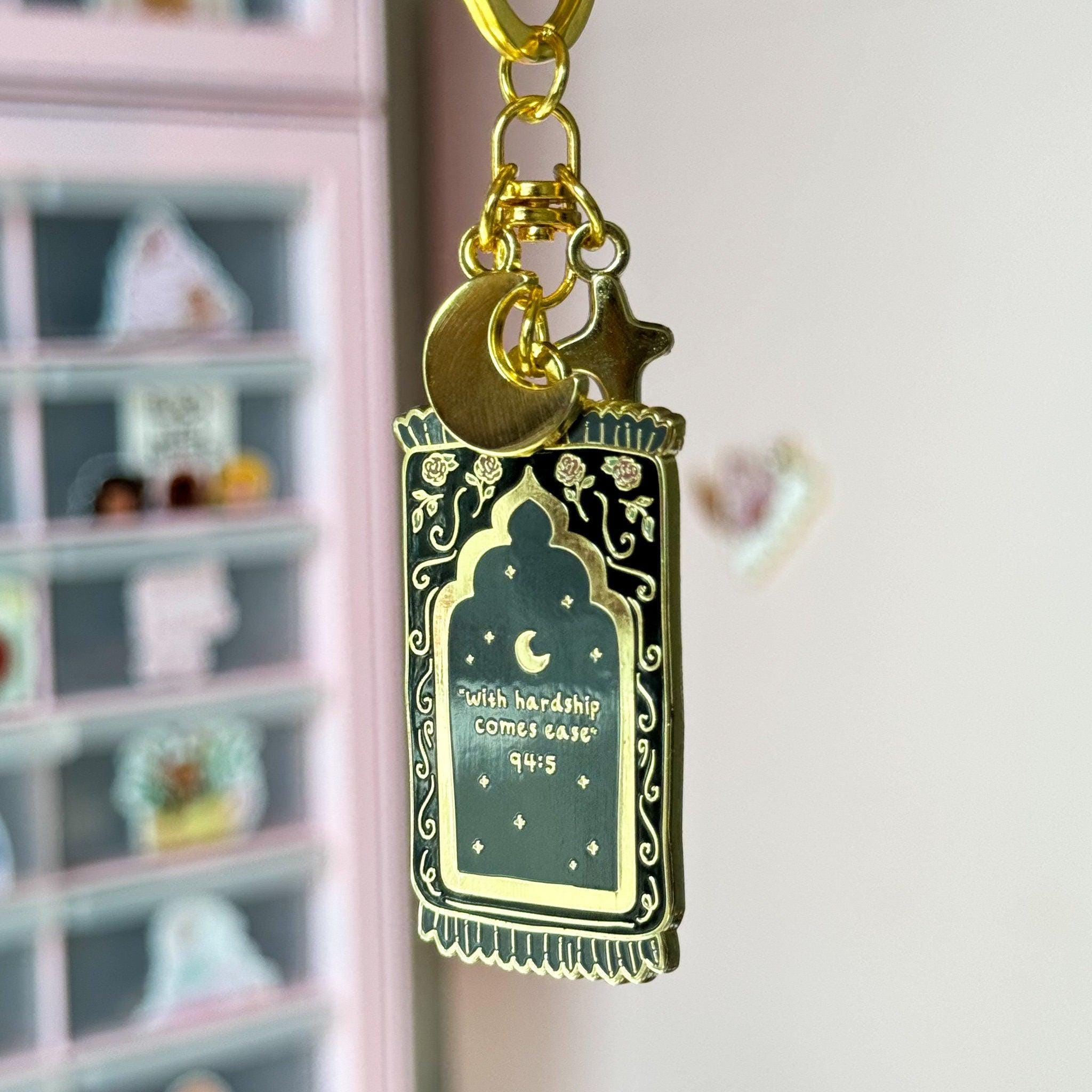 Keychain - With Hardship Comes Ease Pink and Black Gold Plated
