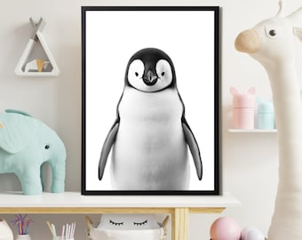 May include: Black and white photograph of a penguin against a white background. The penguin is looking directly at the camera.