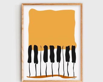 May include: Abstract art print featuring a yellow rectangle with black and white piano keys at the bottom. The print is framed in a light wood frame.
