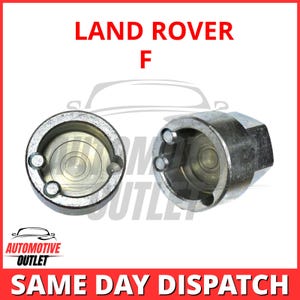 Può includere: Due strumenti di rimozione dei dadi delle ruote in metallo argentato per Land Rover F. Gli strumenti hanno una forma circolare con un foro centrale e tre punte.