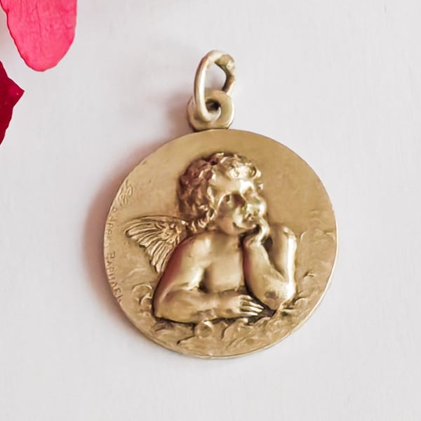 Médaille religieuse ancienne edouardienne ange d'après Raphaël métal argenté Art Nouveau France cupid putti cloches bells