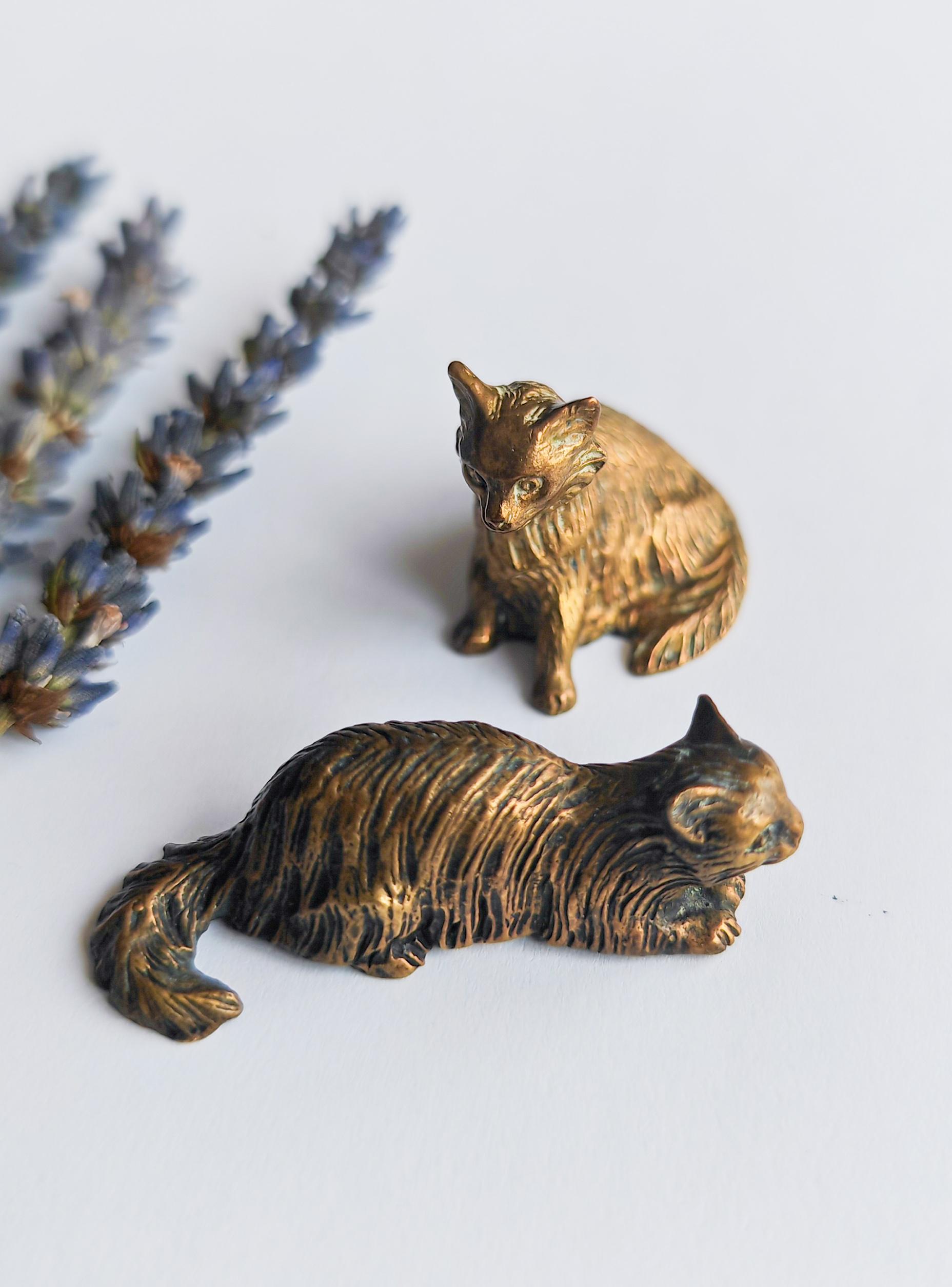 Two antique bronze cat sculptures from France