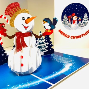 Felices Fiestas: Muñeco de Nieve y un Pajarito ~ Tarjeta de Felicitación Navideña 3D Pop Up Hecha a Mano con Amor. Compra en Línea: https://origamipopcards.com/