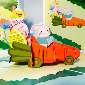 Carte de voeux pop-up 3D Lapin de Pâques dans une voiture carotte faite main avec amour par Origami Pop Cards - ACHETEZ EN LIGNE https://origamipopcards.com/