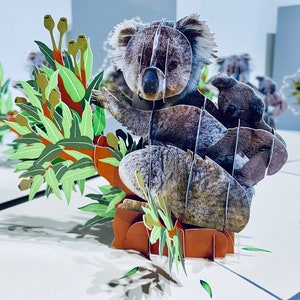 Australische kaart met koala-moeder en baby Australische wilde dieren - pop-kaarten gemaakt door origami - 3D magische papieren pop-upkaarten - Sydney, Australië