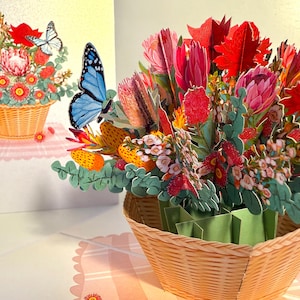 Australische inheemse bloemenmand met blauwe vlinder Happy Birthday pop-origamikaarten Online winkelen https://origamipopcards.com/