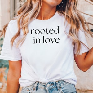 Rooted in Love Black Writing Unisex t-shirt