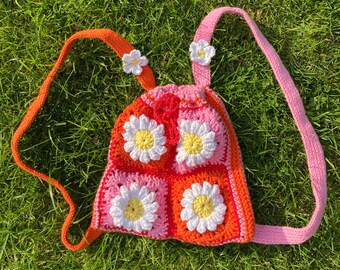 Daisy crochet mini backpack in orange, pink and red