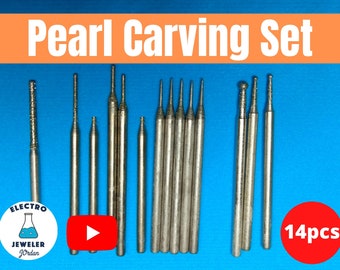 May include: A set of 14 silver pearl carving tools on a blue background. The tools are arranged in a row and are all different sizes and shapes. The text "14pcs" is visible in the lower right corner of the image.