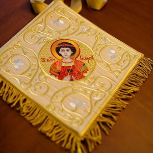 Orthodox priest palitsa Epigonation with the icon of st. George