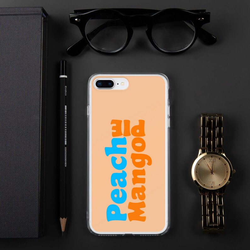 May include: A peach and orange iPhone case with the text "Peach Mango" in blue and orange letters.