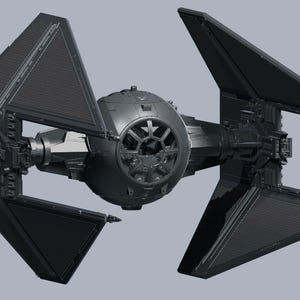May include: A black TIE fighter spacecraft with distinctive hexagonal solar panels and a central spherical cockpit. The spacecraft is a detailed model, showcasing its angular design and intricate mechanical features. The background is a solid gray.