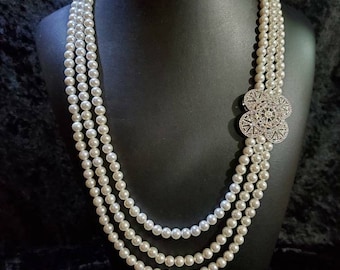 3-Strand Pearl Necklace Adorned With Crystal Pave Componant And Clasp